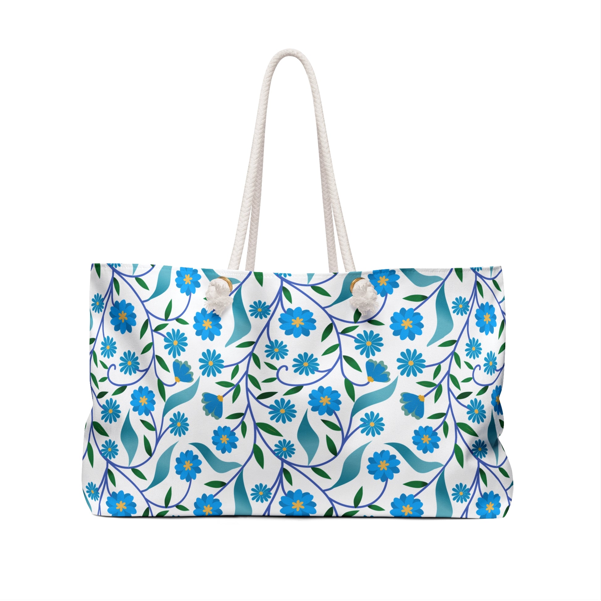 Weekender Bag with rope handles, featuring a floral pattern of blue flowers and green leaves on white, offers a stylish and spacious option for travel, embodying FireBrook Essentials' vibrant and joyful design ethos.