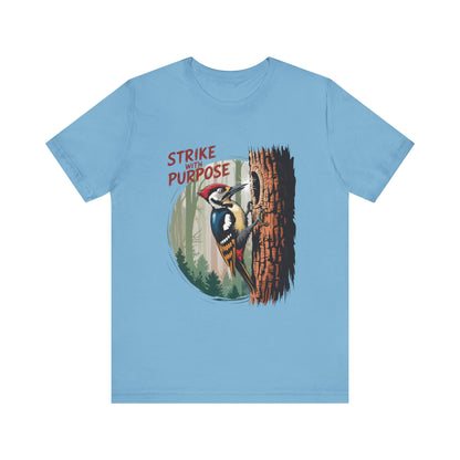 Woodpecker: Strike with a Purpose Bella+Canvas Unisex T-Shirt showcases a woodpecker design, embodying motivation and inspiration, ideal for nature enthusiasts seeking stylish, comfortable apparel from FireBrook Essentials.