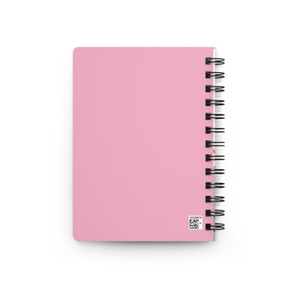 SPIRAL JOURNAL, DURABLE GLOSSY COVER, RULED, 5X7, PASTEL FIELD - A spiral-bound notebook with a solid pink cover and black coils, featuring a small QR-style label on the cover.