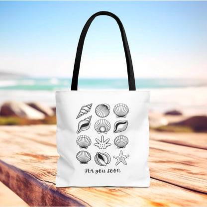 Sea Shells Tote Bag featuring a beach-inspired design, crafted from durable polyester with reinforced handles, ideal for seaside trips. Available in various sizes, embodying FireBrook Essentials' commitment to stylish, functional accessories.
