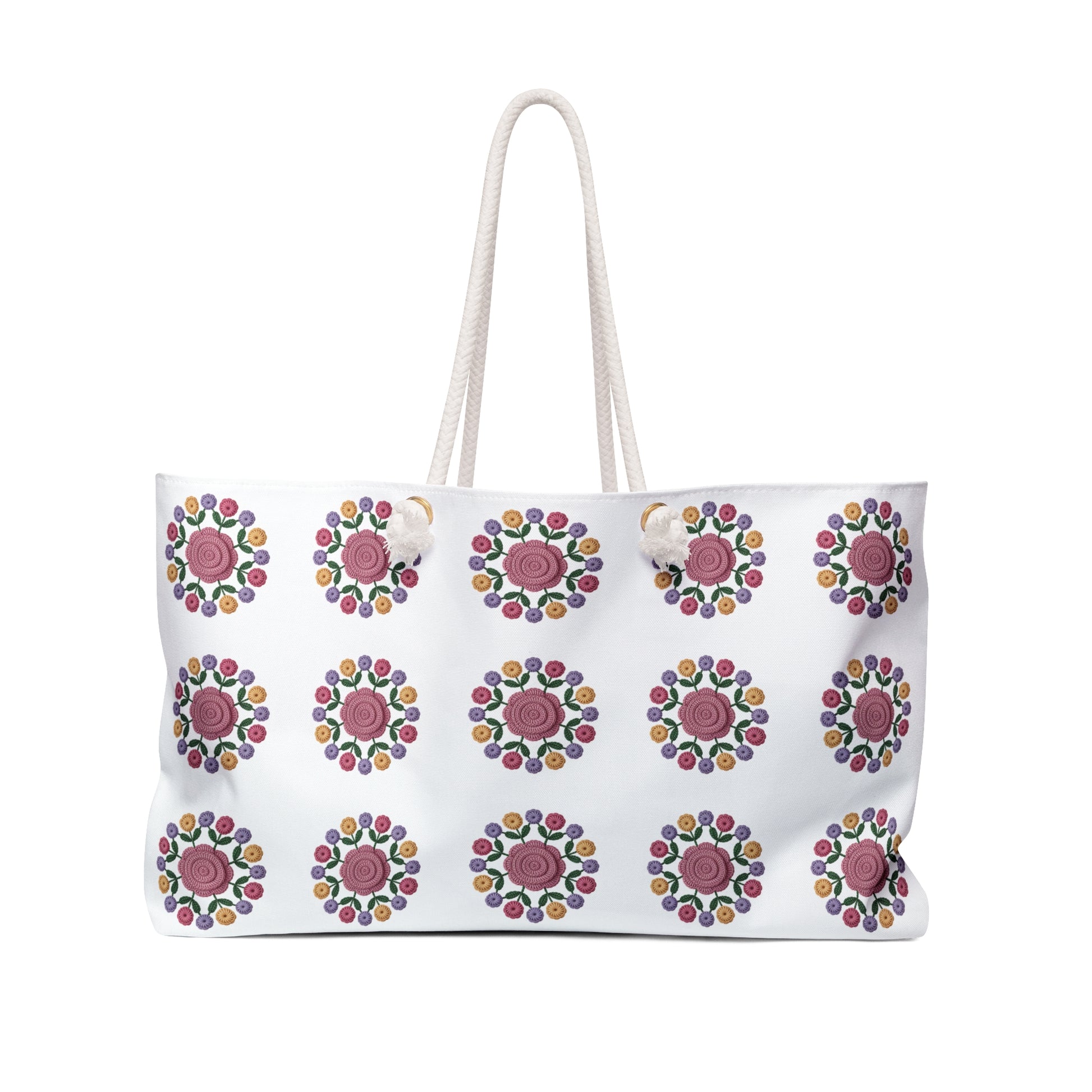 Crochet Floral Weekender Bag displaying intricate crochet floral patterns with rope handles, ideal for stylish travel. Perfect for weekend trips, combining elegance and functionality, aligning with FireBrook Designs' uplifting ethos.