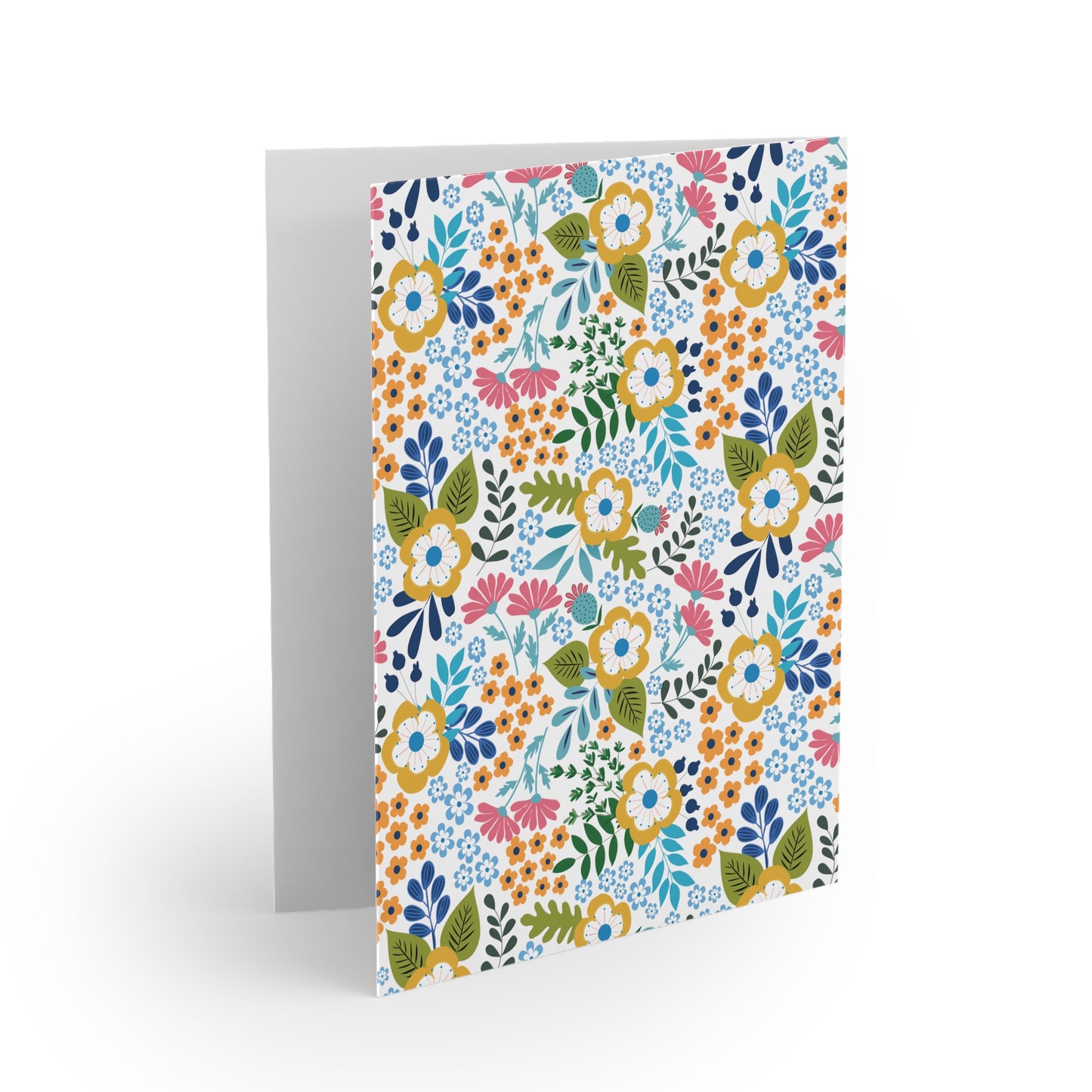 Wildflower Greeting Cards — Pack of 8/16/24 features hand-drawn floral patterns on a white background, offering a vibrant, springtime feel. Includes matching envelopes, perfect for heartfelt messages.