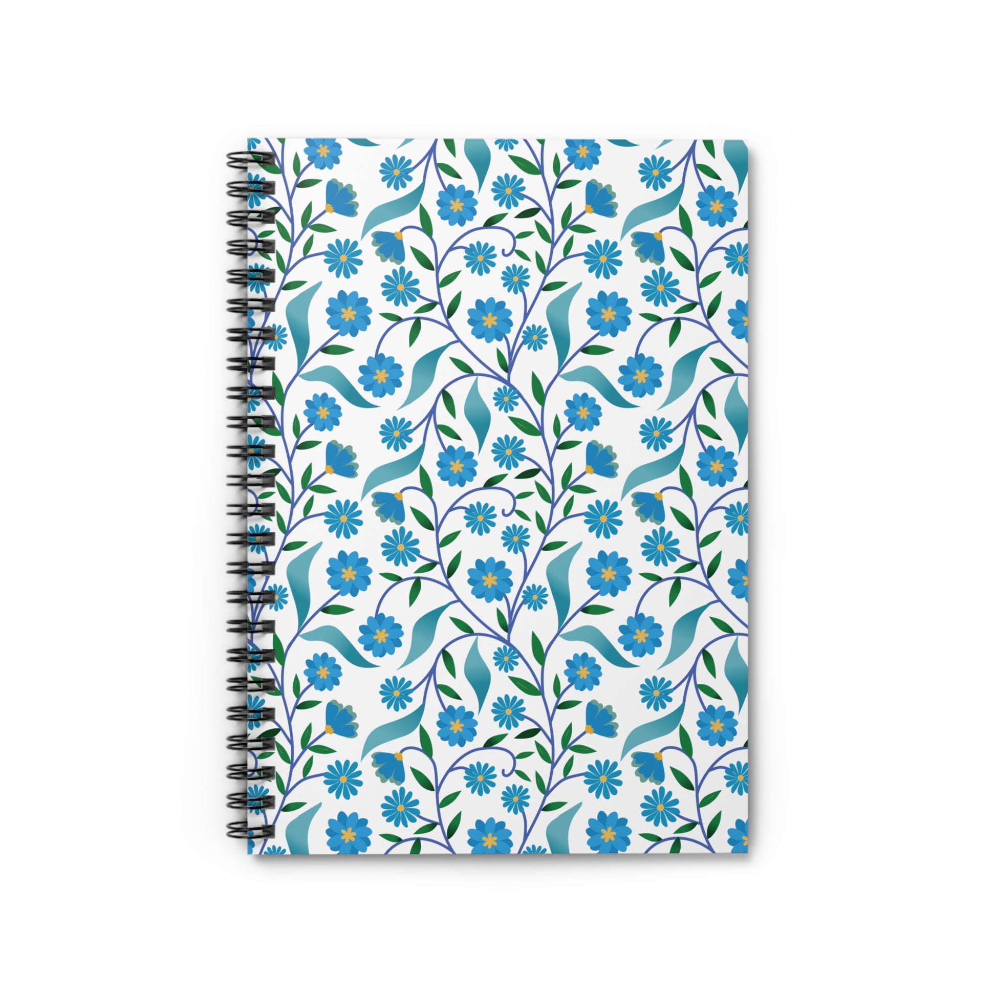 Floral Spiral Notebook featuring a vibrant, all-over floral pattern with blue blossoms and green leaves on a white cover, designed for creativity and organization with durable metal binding and compact portability.