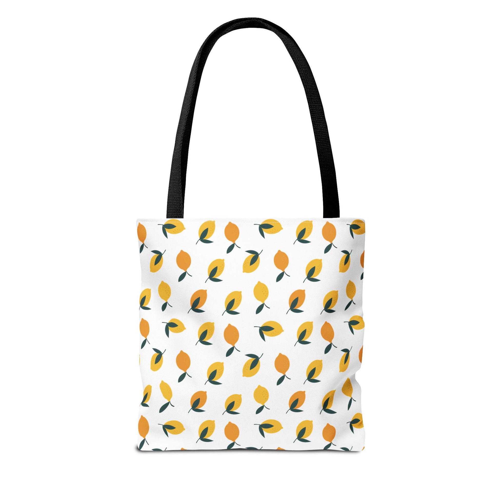 Lemon Drop Toss Tote Bag features a vibrant lemon motif with alternating yellow hues and green leaves, complemented by black straps. Ideal for summer outings, it embodies FireBrook Essentials' joyful, stylish design ethos.
