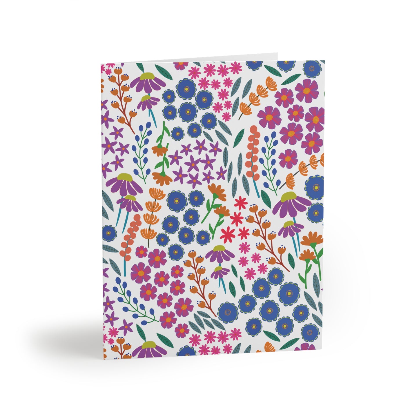 Floral Greeting Cards — Pack of 8/16/24, featuring a vibrant, stylized floral pattern on both front and back, standing upright on a white surface, embodying FireBrook Designs' uplifting and joyful essence.
