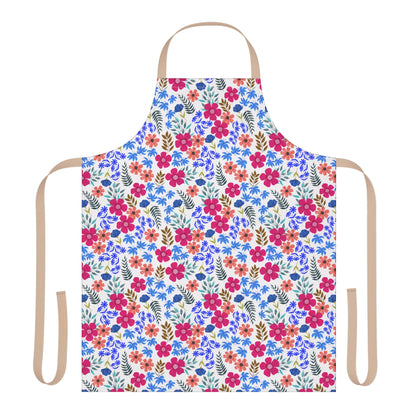 Apron Floral Design: A vibrant full-coverage apron with multicolored floral pattern and tan straps, crafted from stain-free polyester canvas, offering comfort and style for cooking or crafting.