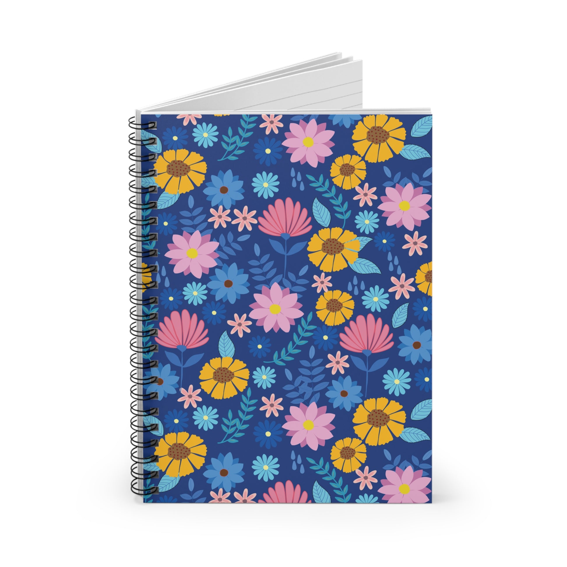 Floral Spiral Notebook with vibrant pink, yellow, and blue blooms on a navy background. Features black metal coil binding and white lined pages, reflecting FireBrook Designs' joyful, creative style.