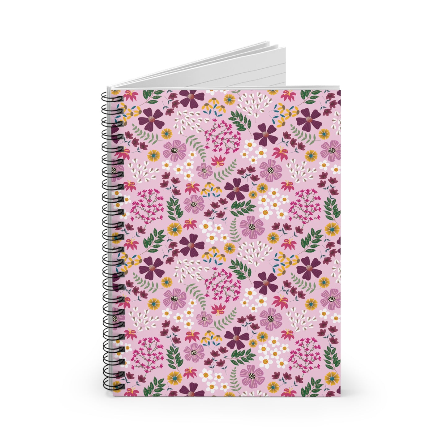 Floral Spiral Notebook with a vibrant floral cover, featuring purple, magenta, white, and yellow flowers on pale pink. Ideal for creative expression with smooth-turning metal binding and lined pages peeking through.