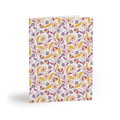 Floral Greeting Cards — Pack of 8/16/24 feature a vibrant floral pattern of stylized blossoms and leaves, offering a cheerful and elegant matte finish, perfect for personal messages or celebrations.
