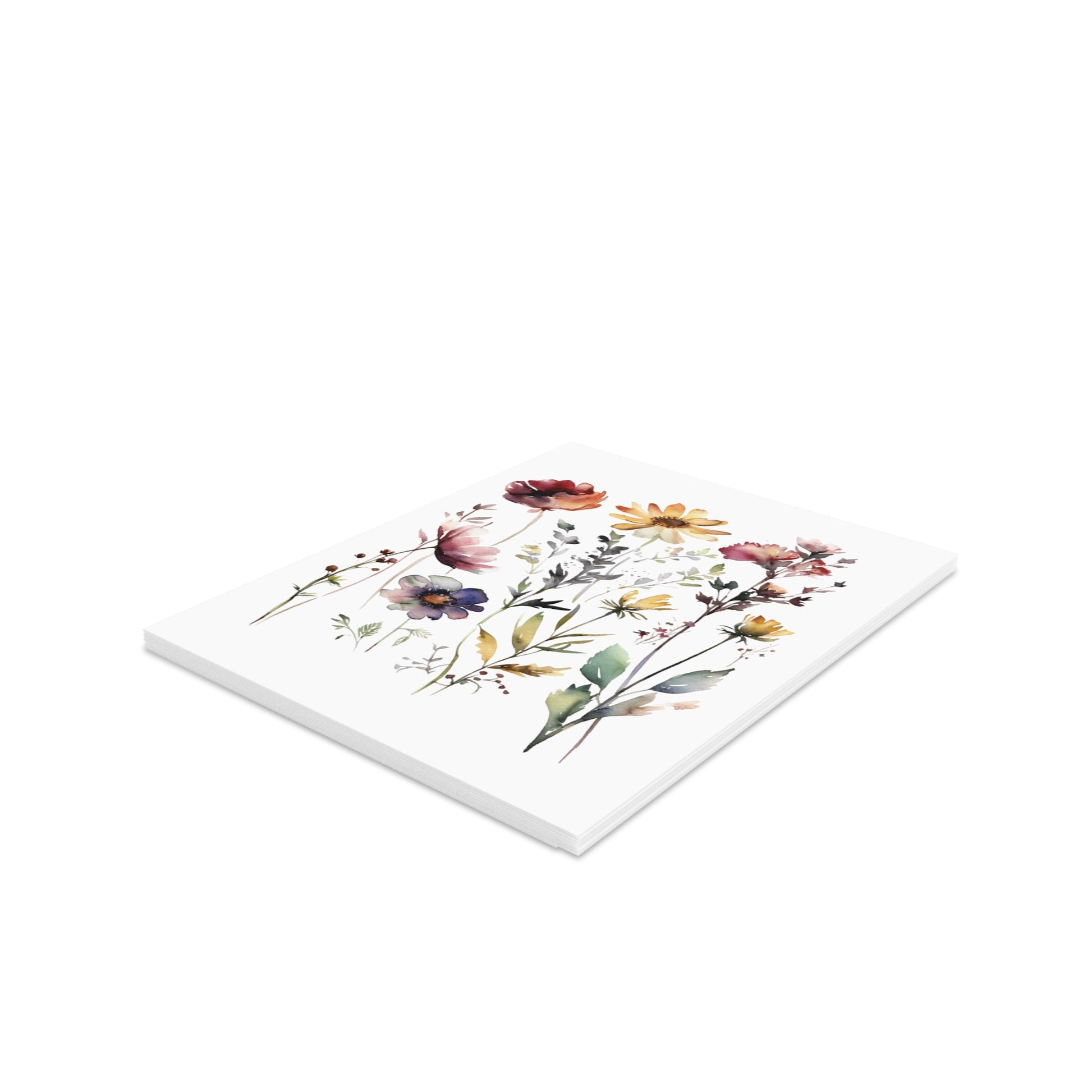 Flower Greeting Cards — Pack of 8/16/24 feature a stack of matte-finish cards adorned with watercolor-style wildflower illustrations, including poppies and daisies, embodying cheerful, personal expressions ready for heartfelt messages.