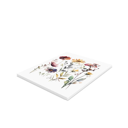 Flower Greeting Cards — Pack of 8/16/24 feature a stack of matte-finish cards adorned with watercolor-style wildflower illustrations, including poppies and daisies, embodying cheerful, personal expressions ready for heartfelt messages.