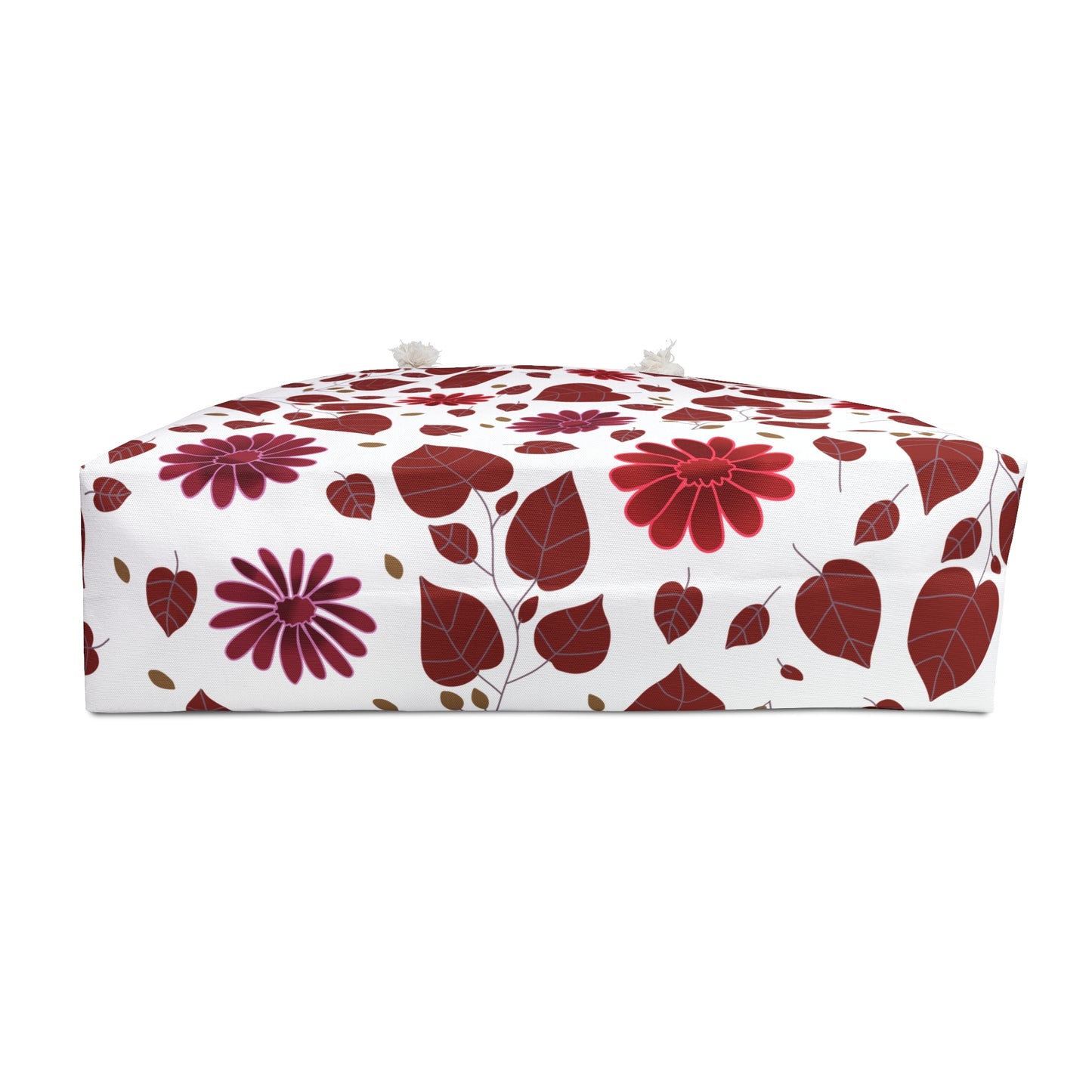 Weekender Bag featuring a white floral pouf design with red and magenta flowers, tasseled handles, and a domed top. Ideal for stylish, joyful travels, enhancing comfort and ease.