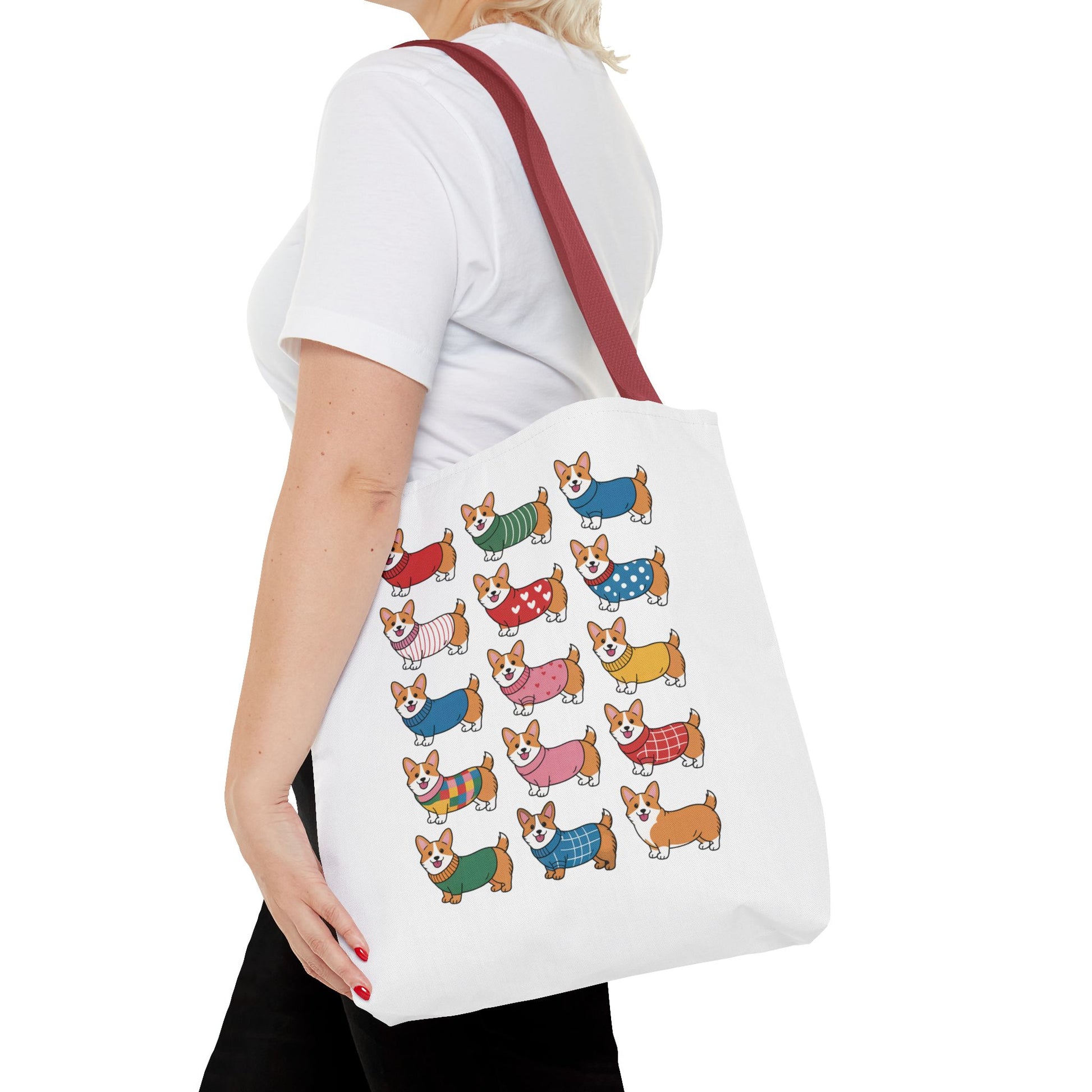 Cheerful Corgi Cartoon Style Dog Lover Tote Bag featuring a grid of cartoon Corgis in playful outfits, ideal for dog enthusiasts. Durable polyester, available in multiple sizes with reinforced handles.
