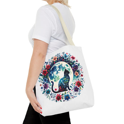 Lone Cat Under the Moon Tote Bag, a playful and whimsical design, ideal for cat lovers. Features durable 100% polyester, reinforced handles, and boxed corners for extra space; perfect for errands or the beach.