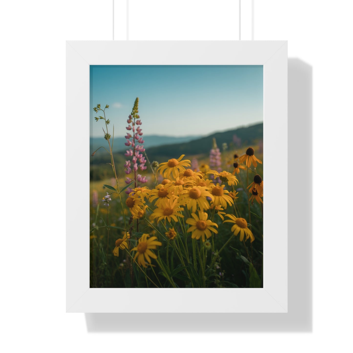 Vertical Poster - Mountain Flowers Design showcases a close-up of vibrant yellow flowers, framed for a serene home decor. Ideal for nature enthusiasts, it adds a peaceful, outdoor touch to any space.