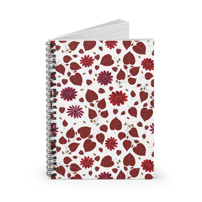 SPIRAL NOTEBOOK, DURABLE COVER, RULES, 6X8 featuring a white cover with reddish-brown leaves and red daisies pattern, visible metal spiral, and edge of blank interior pages, perfect for stylish, joyful note-taking.