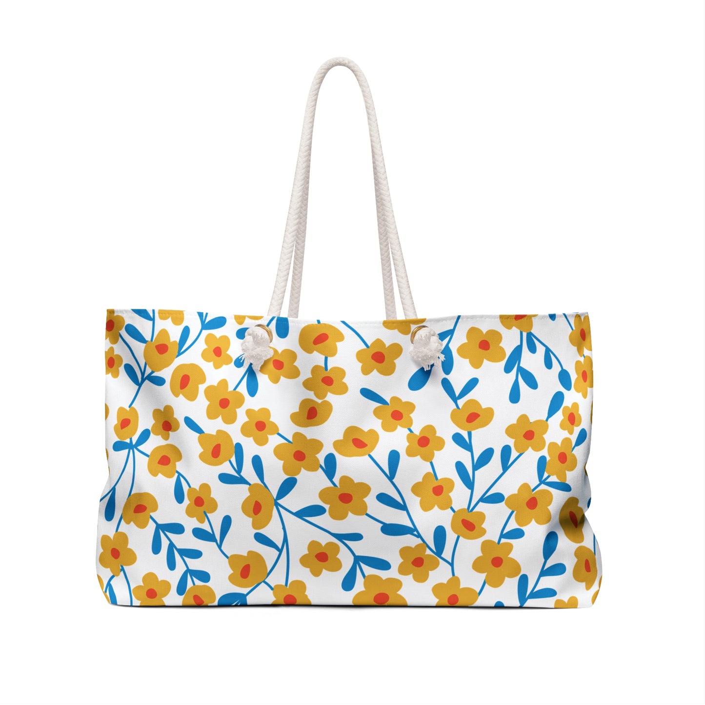 Weekender Bag featuring a white canvas body adorned with mustard-yellow floral patterns and blue stems, complemented by sturdy white rope handles, ideal for stylish travel and spacious enough for weekend essentials.