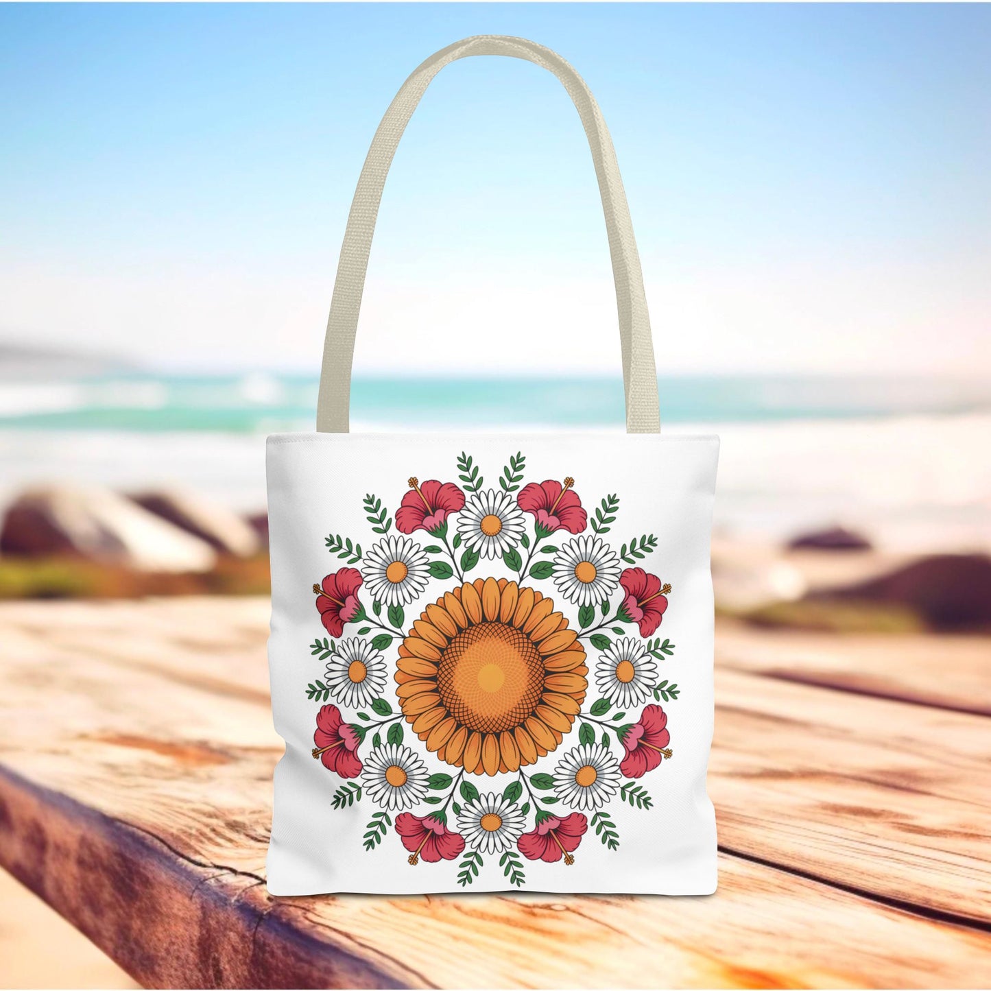 Mandala Sunflowers & Daisies Tote Bag featuring a vibrant, symmetrical floral design with a central orange sunflower, surrounded by white daisies and pink hibiscus, perfect for boho-chic summer outings.