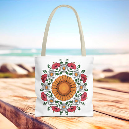 Mandala Sunflowers & Daisies Tote Bag featuring a vibrant, symmetrical floral design with a central orange sunflower, surrounded by white daisies and pink hibiscus, perfect for boho-chic summer outings.