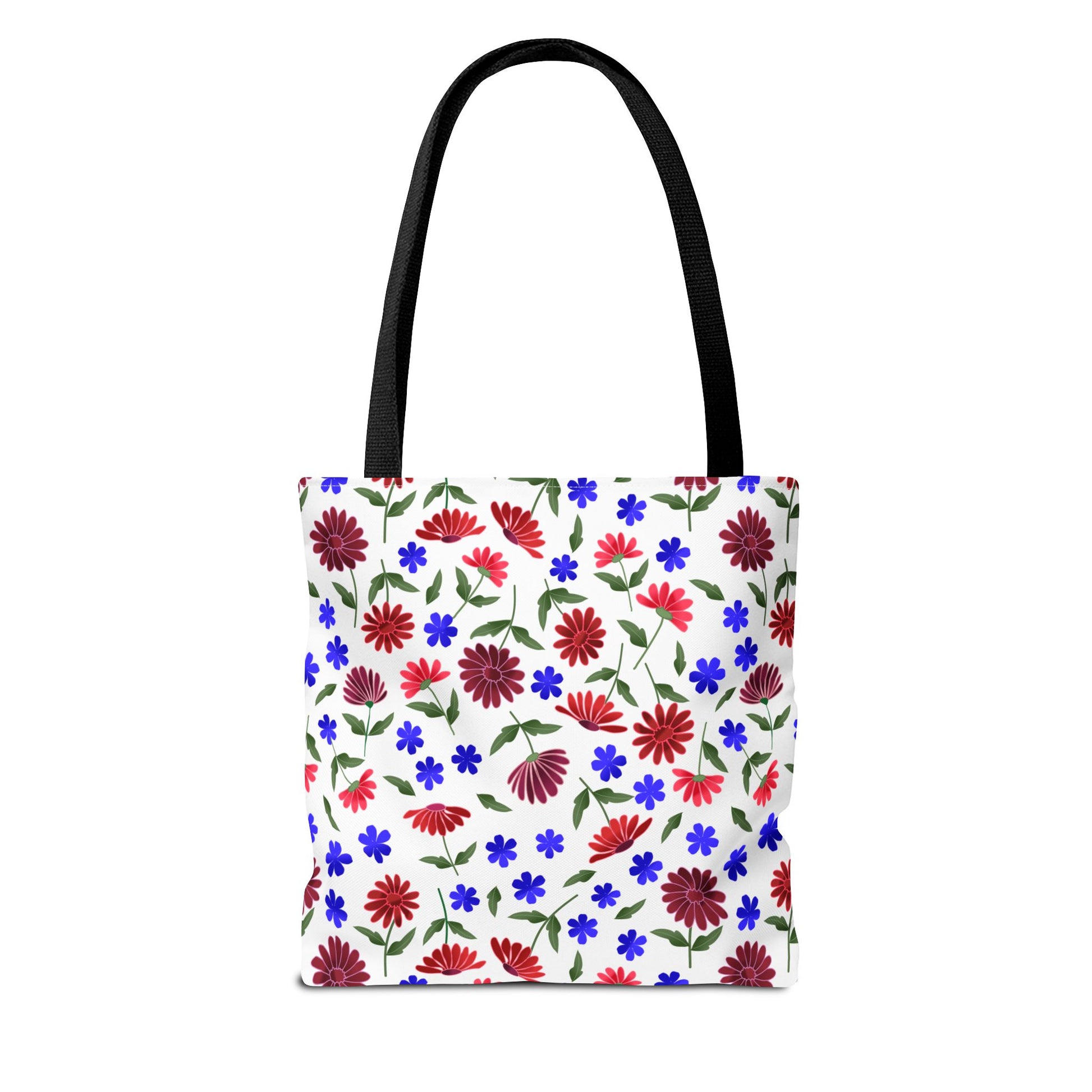 Floral Pattern Tote Bag — Red & Blue Wildflower All-Over Print: A white tote bag featuring vibrant red daisies and blue flowers with green stems, black handles, and spacious boxed corners for versatile everyday use.