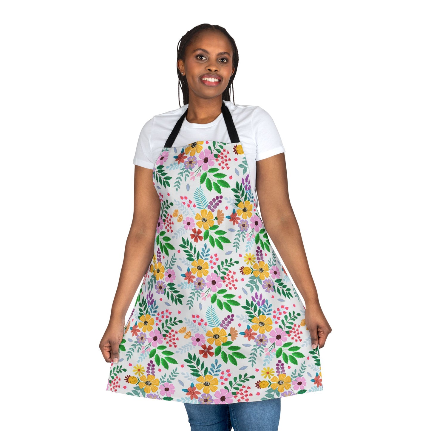 Person wearing a Floral Apron with vibrant multicolored flowers, showcasing FireBrook Essentials' commitment to comfort and style. The apron features a tie-back closure, ideal for cooking or crafting.