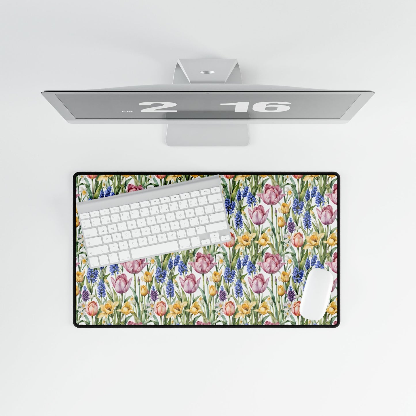 Desk Mat - Spring Garden Tulips Daffodils Hyacinths, showcasing a serene floral design with a keyboard on it, ideal for adding tranquility to your workspace. Perfect for nature enthusiasts.