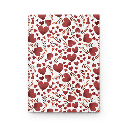 HARDCOVER JOURNAL, MATTE, RULED, 5X7, SEWN BIND, CLEAN-TEAR PAGES – HEARTS features a festive cover with red hearts and sprigs pattern, offering 150 lined pages for joyful note-taking.