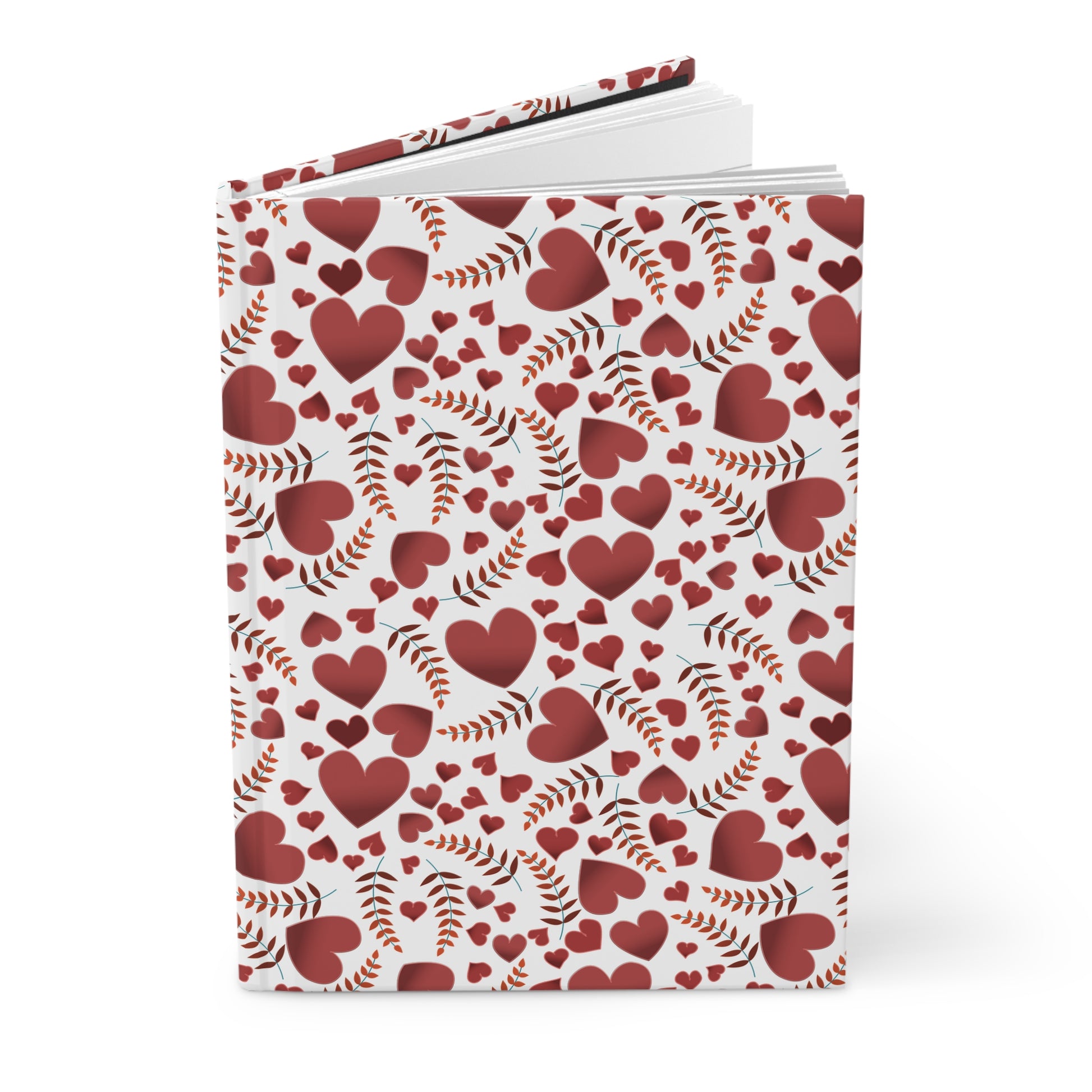 HARDCOVER JOURNAL, MATTE, RULED, 5X7, SEWN BIND, CLEAN-TEAR PAGES – HEARTS, featuring a cover with red hearts and leaf-sprigs pattern, standing upright with visible spine and open pages.