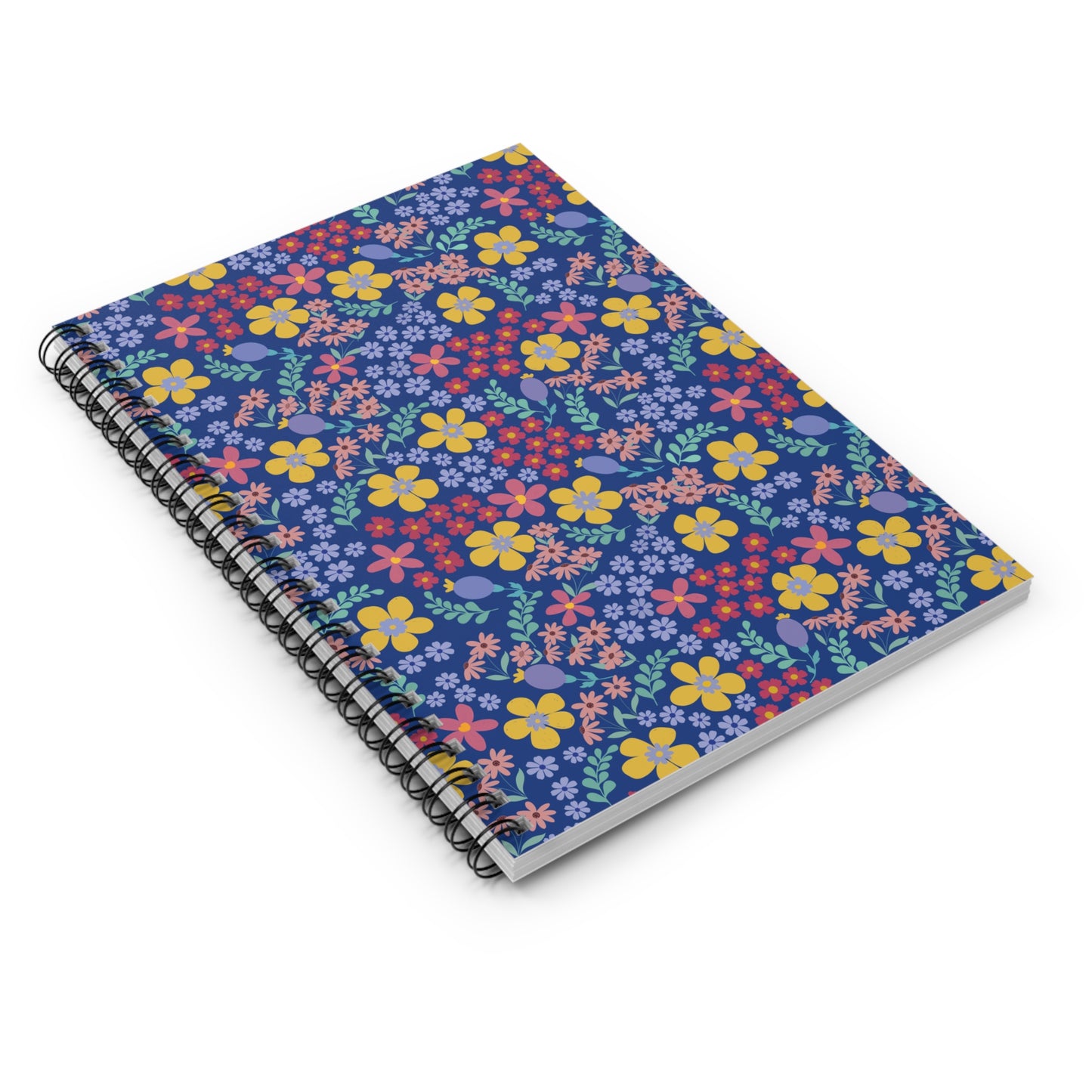 Floral Spiral Notebook featuring a vibrant, all-over floral design on a deep blue cover, black wire binding, and slightly fanned pages, reflecting FireBrook Essentials' commitment to joyful, uplifting designs.
