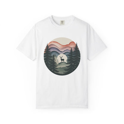 Nature Wanderer T-Shirt showcasing layered mountain silhouettes and a celestial moon, adorned with a minimalist stag. Ideal for outdoor enthusiasts, this comfortable garment-dyed tee embodies tranquility and wilderness.