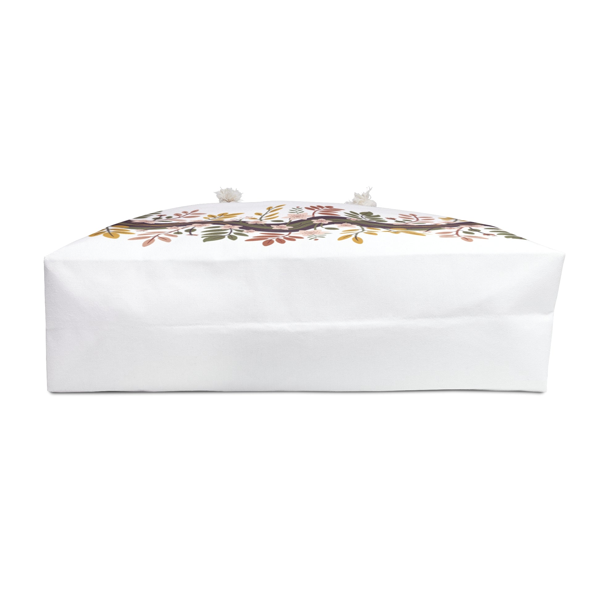 Botanical Weekender Bag featuring a playful floral and leaf design, ideal for stylish getaways. Made from durable polyester with rope handles and a cream interior, offering both practicality and a whimsical touch.