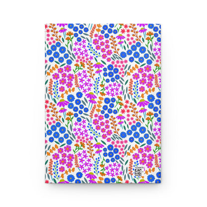 HARDCOVER JOURNAL, MATTE, RULED, 5X7, SEWN BIND, CLEAN-TEAR PAGES – WILDFLOWER PARADE features a bright floral pattern with a QR-style graphic, embodying FireBrook Designs' uplifting and stylish essence.