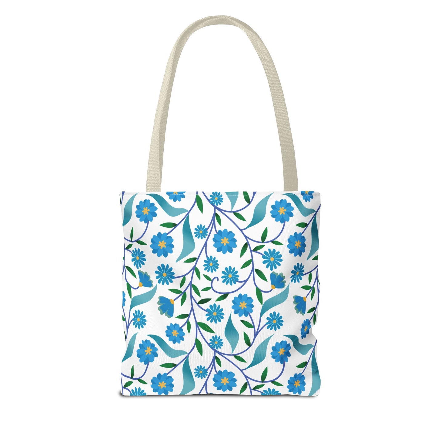 Blue Floral Tote Bag with natural-beige straps, featuring vibrant blue daisies and green leaves on a white background. Ideal for summer outings, offering durability and style from FireBrook Essentials.