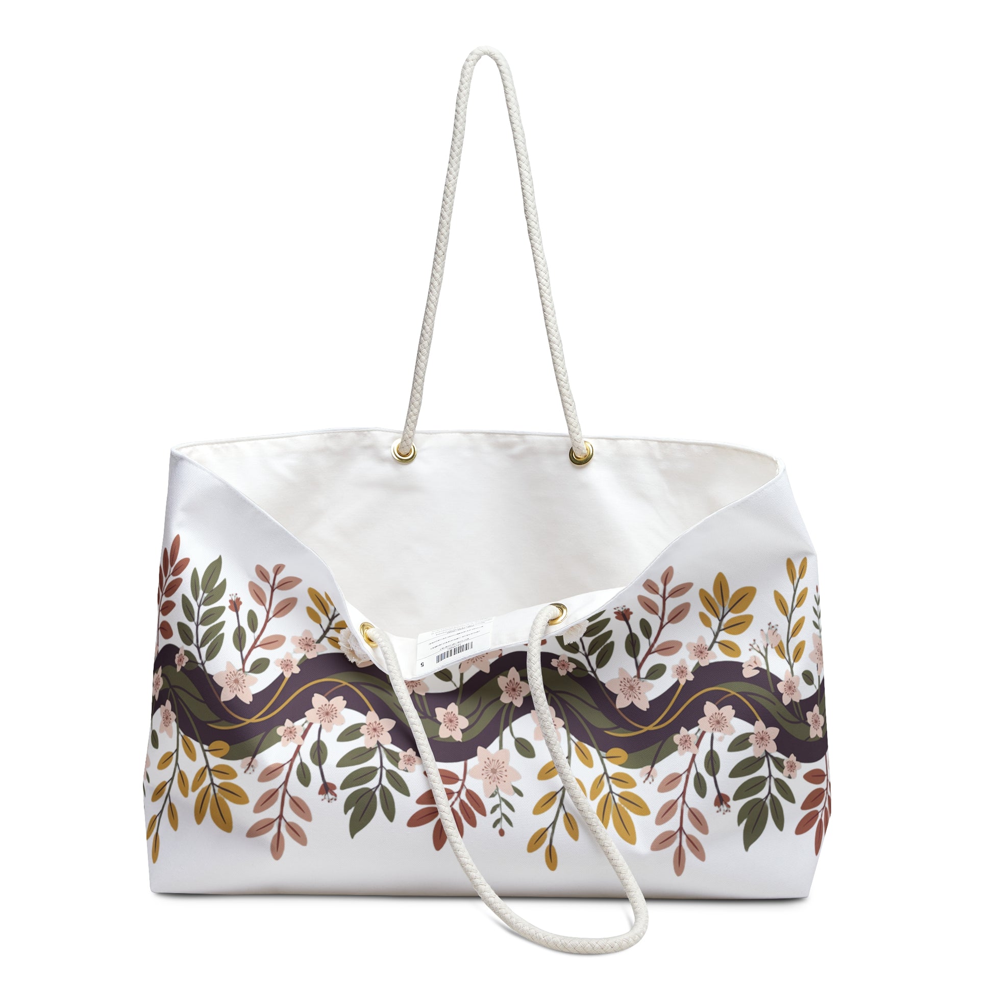 Botanical Weekender Bag: A close-up of floral and leaf patterns on a spacious bag with durable rope handles and metal grommets, ideal for joyful, stylish travel.
