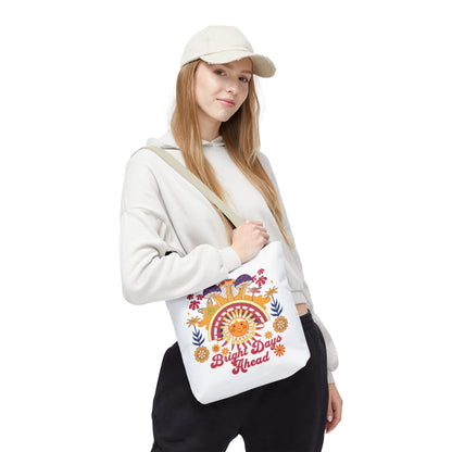 Bright Days Ahead Sunshine Floral Tote Bag featuring vibrant sunshine, flowers, and butterflies, ideal for joyful outdoor adventures. Available in multiple sizes, with durable polyester body and reinforced handles for strength.