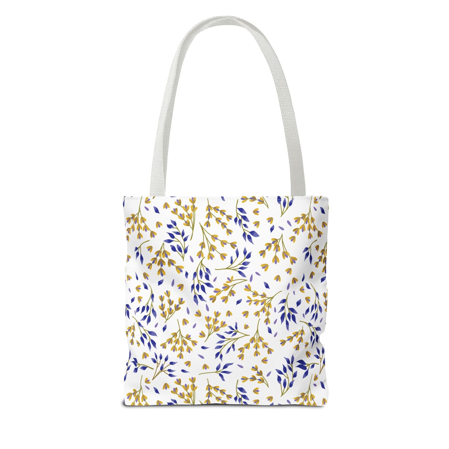 Floral Tote Bag with golden yellow and deep blue botanical sprigs on white canvas, featuring slim white straps. Perfect for joyful summer outings, reflecting FireBrook Designs' commitment to stylish and uplifting essentials.