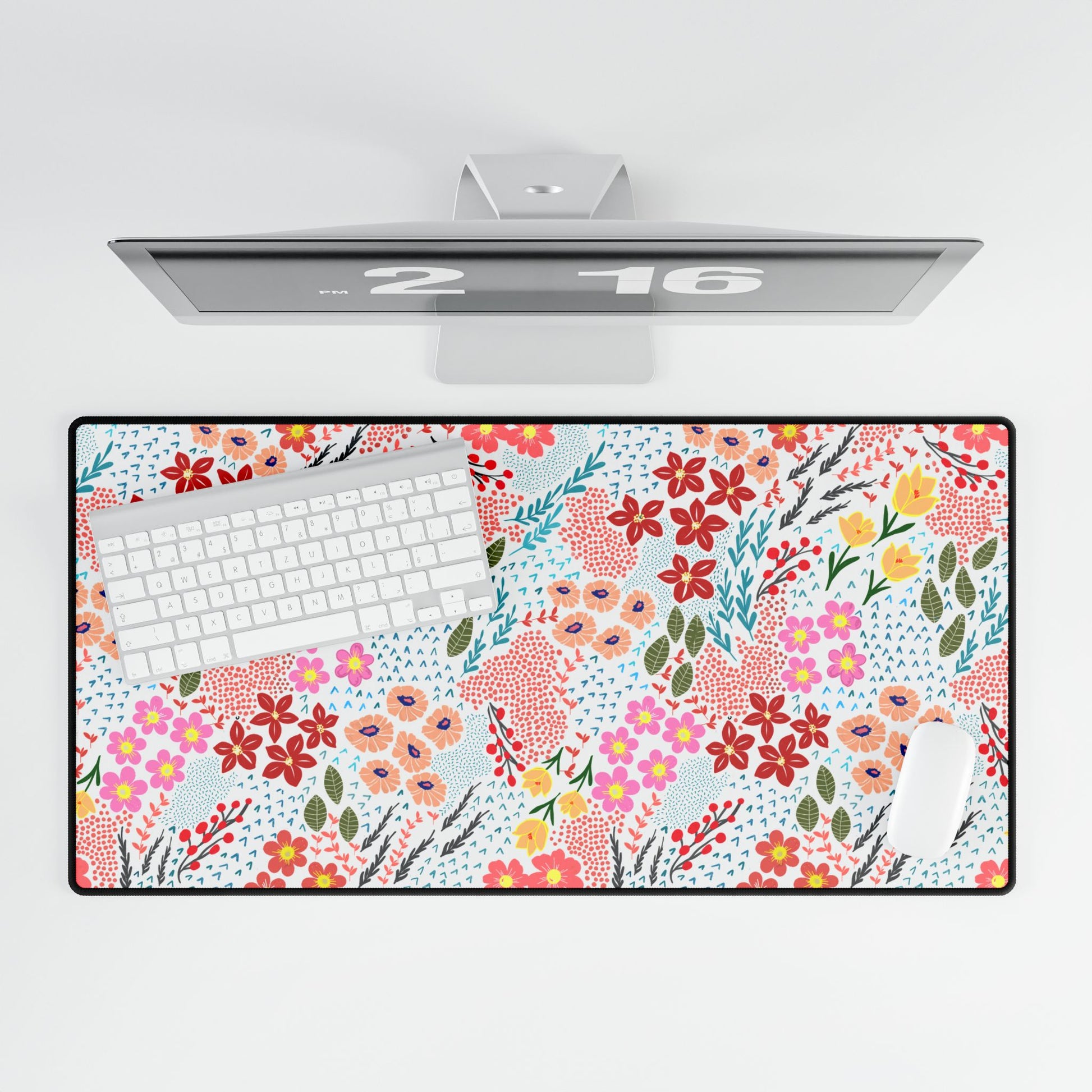 Desk Mats - Garden Floral Pattern: Overhead view of a workspace featuring a floral-patterned desk mat, with a white wireless keyboard and mouse. Adds elegance and color to enhance productivity and joy.