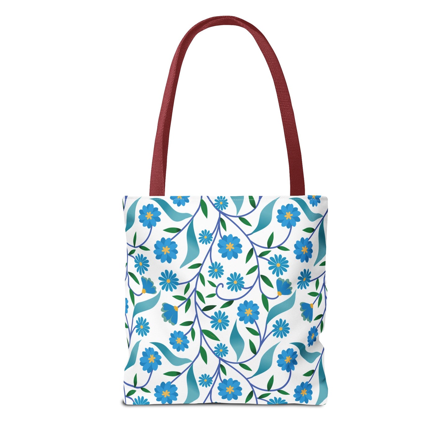 Blue Floral Tote Bag with long red handles, featuring a vibrant pattern of blue flowers and green leaves on a white background, embodies FireBrook's joyful and stylish design ethos, perfect for summer outings.