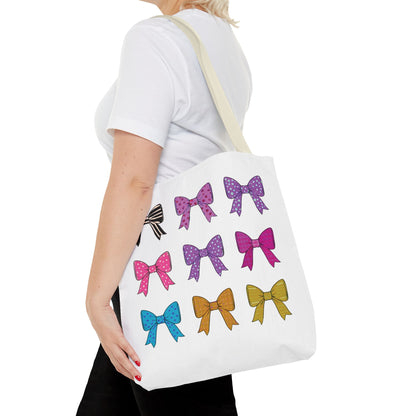 A woman carries the Bows Ribbons Tote Bag, featuring a playful bow design, ideal for stylish, practical everyday use.
