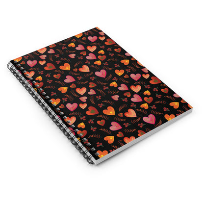 SPIRAL NOTEBOOK, DURABLE COVER, RULES, 6X8 featuring a stylish black cover with red, orange, and pink heart patterns, metal spiral binding, ideal for on-the-go note-taking with eco-friendly paper.