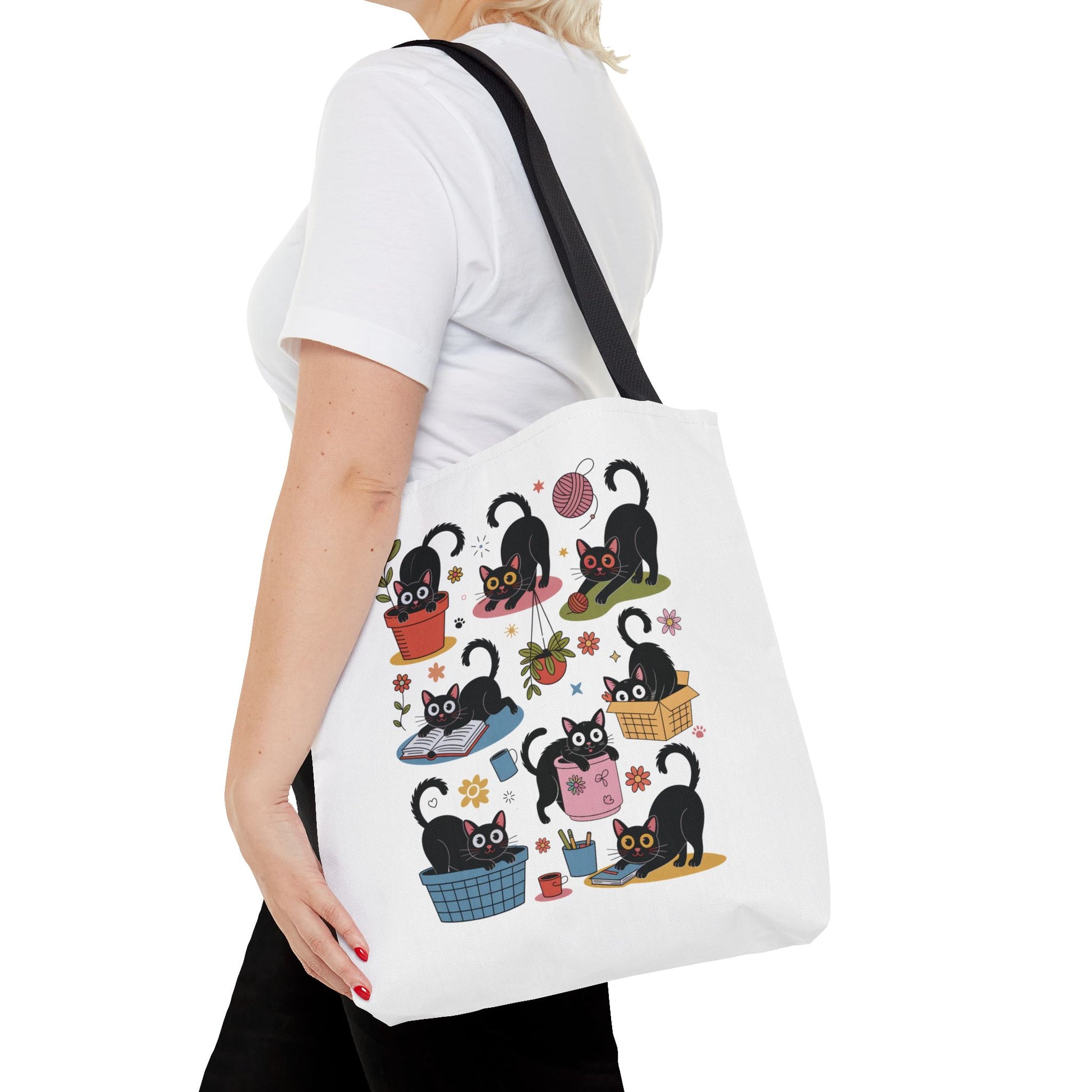 Cat Tote Bag - Curious Cat Design: A whimsical tote bag perfect for cat lovers, featuring a playful cat illustration. Ideal for daily use, it combines style with durability, embodying FireBrook Essentials' joyful and uplifting design ethos.