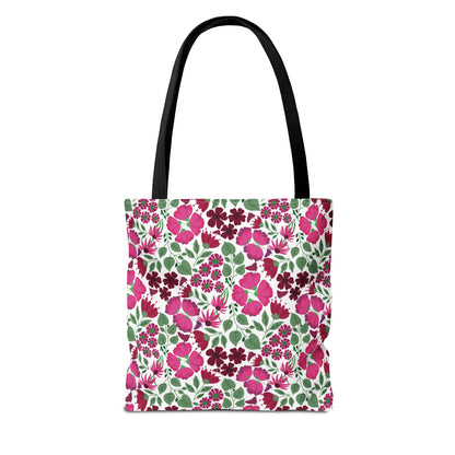Pink Lady Tote Bag featuring a vibrant floral pattern with pink and burgundy flowers, black handles, ideal for everyday use, blending style and practicality to uplift any outfit.