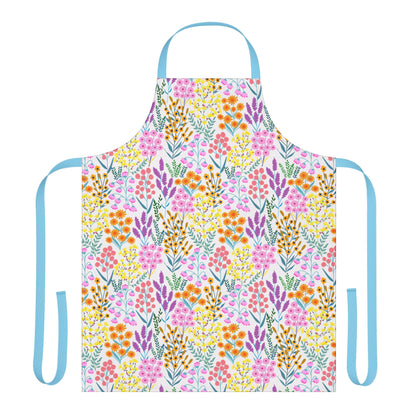Floral Apron with a vibrant wildflower pattern in pinks, oranges, yellows, lavender, and greens. Features light-blue neck loop and waist ties, ideal for comfortable, stylish use in cooking or crafting.