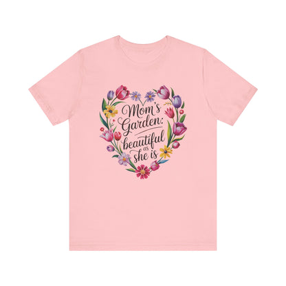Mom's Garden is as Beautiful as She Is Mother's Day Comfort Colors Unisex T-Shirt, featuring a heart-shaped floral design, perfect for celebrating mothers with its uplifting message and stylish pink aesthetic.