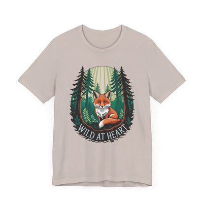Wild at Heart Fox Illustration Bella+Canvas Unisex T-Shirt featuring a whimsical cartoon fox amidst trees, perfect for nature enthusiasts. Comfortable and lightweight, ideal for casual wear.