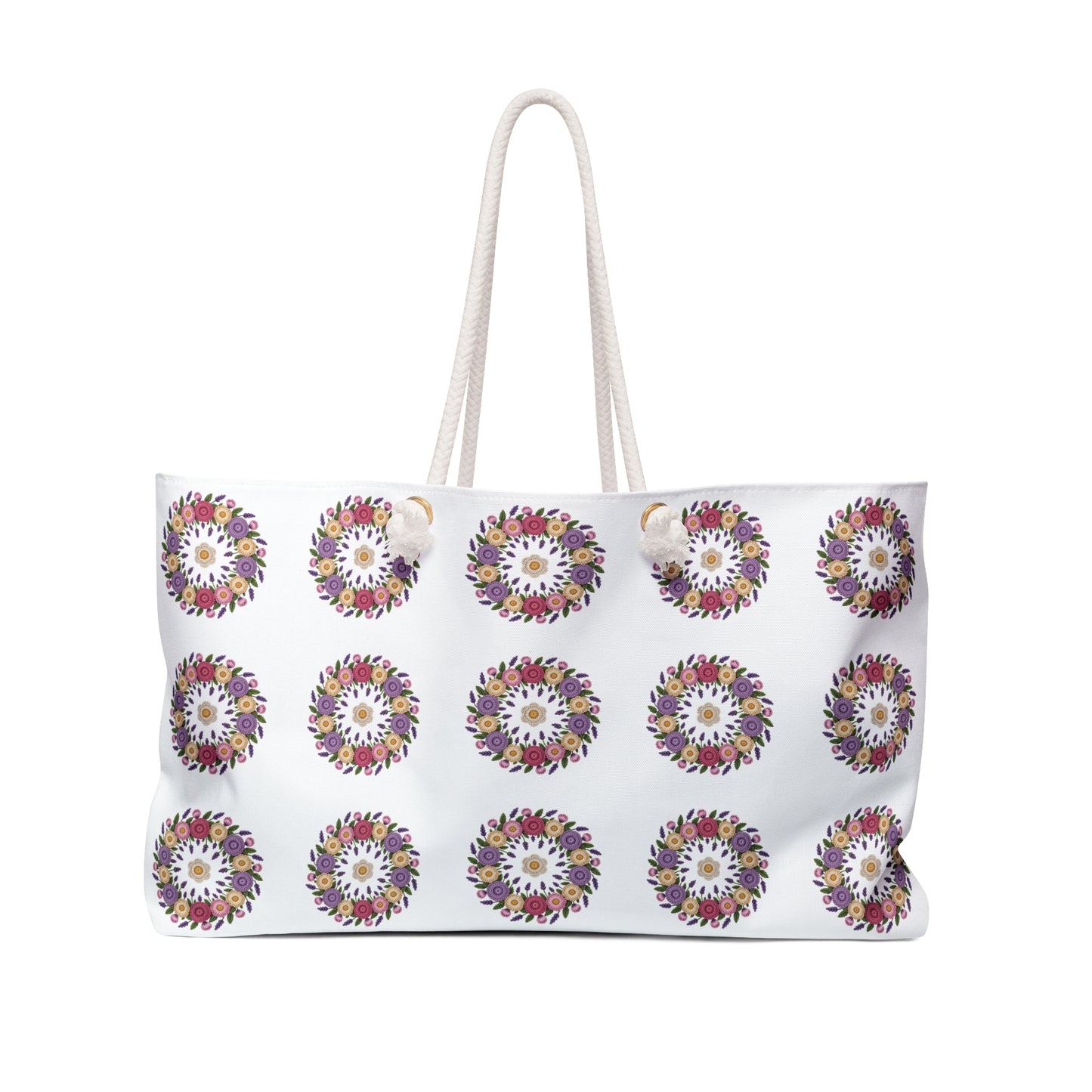 Crochet Floral Weekender Bag with detailed crochet floral pattern and cream background. Spacious, stylish bag for weekend getaways, featuring comfortable cotton rope handles and luxurious cream sheeting interior lining.