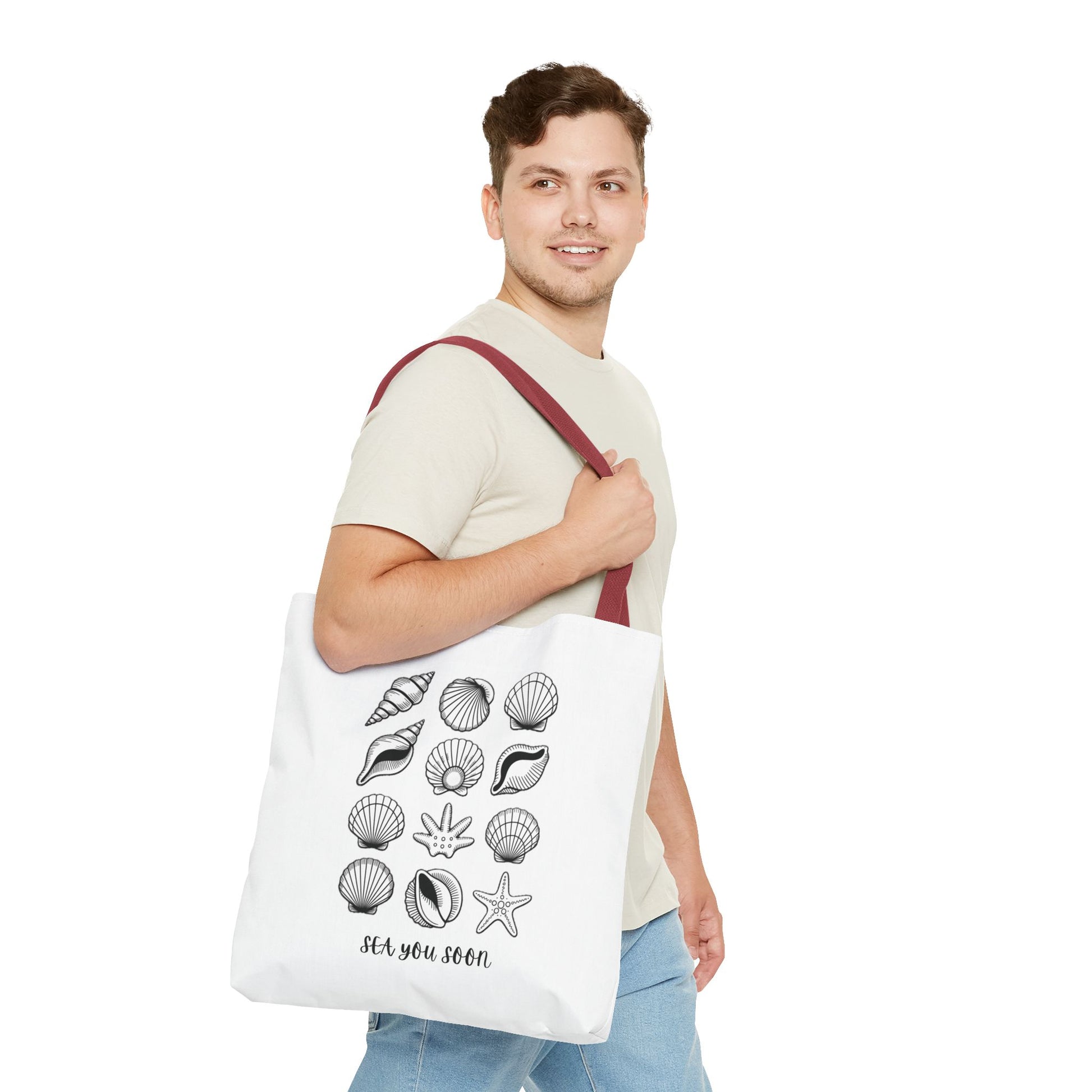 Sea Shells Tote Bag with a nautical theme, showcasing durable polyester fabric and reinforced stitching, ideal for beach lovers. Perfect for carrying essentials on seaside trips, reflecting FireBrook Essentials' joyful and uplifting style.