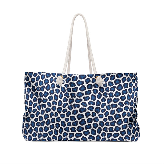 Weekender Bag Blue Cheetah Print: A stylish, spacious shoulder bag with a blue and white leopard pattern, featuring durable rope handles and a stable T-bottom design, ideal for fashion-forward travelers.