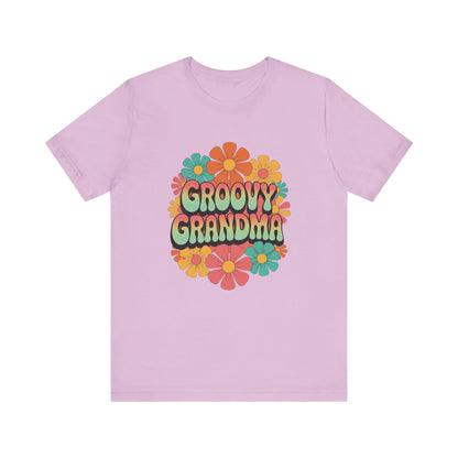 Groovy Grandma for Mother's Day Bella+Canvas Unisex T-Shirt featuring a vibrant flower design, embodying retro charm. Ideal for vintage-loving grandmas, this stylish tee perfectly aligns with FireBrook Essentials' joyful apparel ethos.