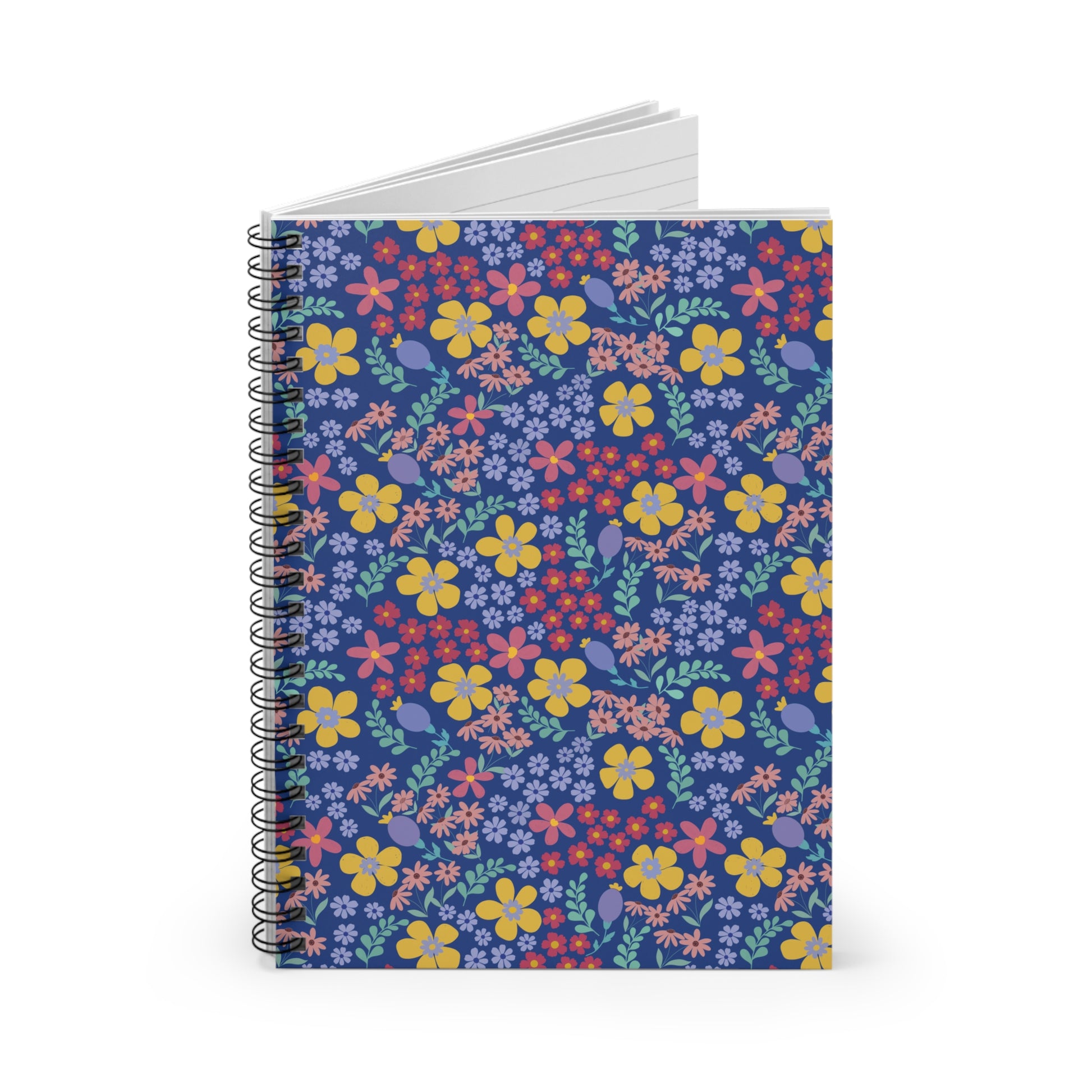Floral Spiral Notebook with vibrant blooms and foliage on a deep blue cover, upright against a white background, showcasing its sleek metal spiral binding and ruled pages for creative note-taking.